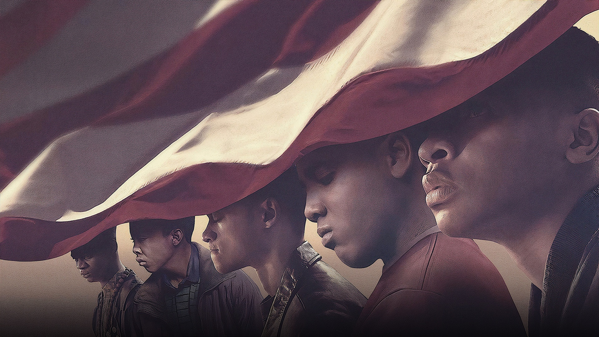 Five accused teenagers lined up under the folds of the American flag in When They See Us