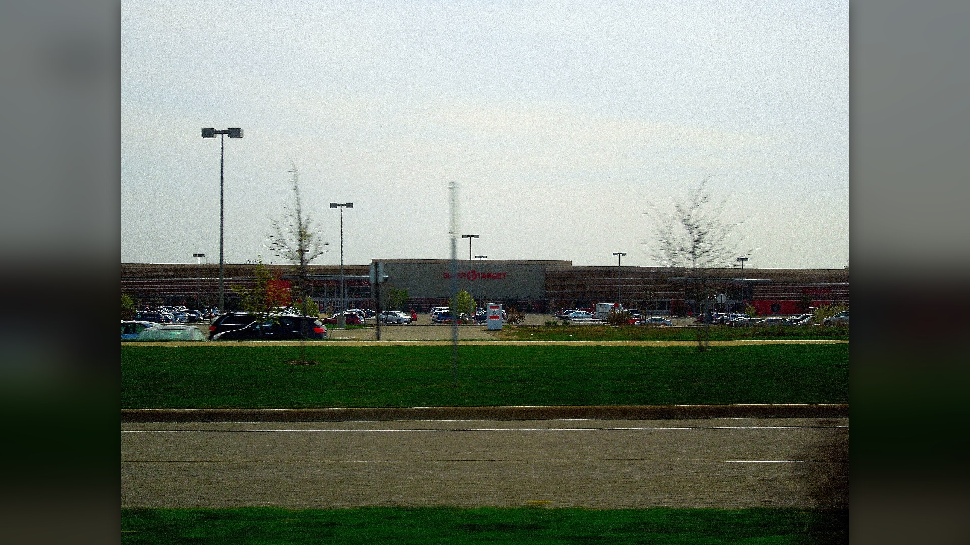 SuperTarget store exterior, highlighting Target's competitive Good & Gather store-brand groceries and Target Circle rewards at #9.