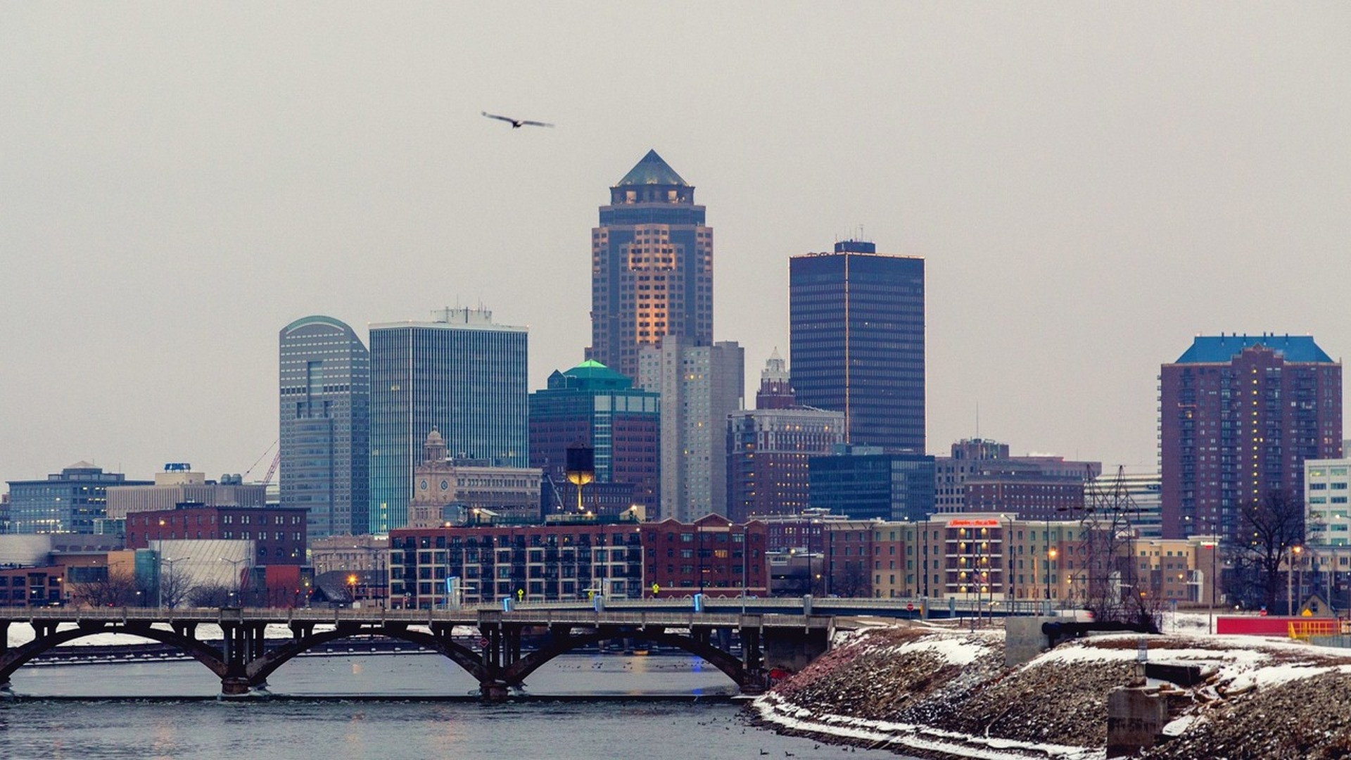 Des Moines River reflecting the modern downtown Iowa skyline from the SE 6th Street bridge.